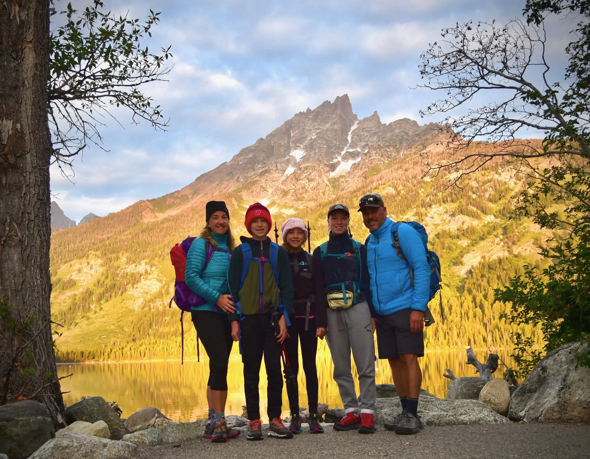 family at sunrise at Jenny Lake.