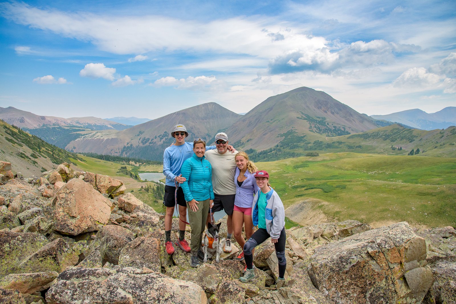 A family portrait at Snow Lake, with Thunder Pass, Lulu Mountain, and Michigan Lakes in the background.